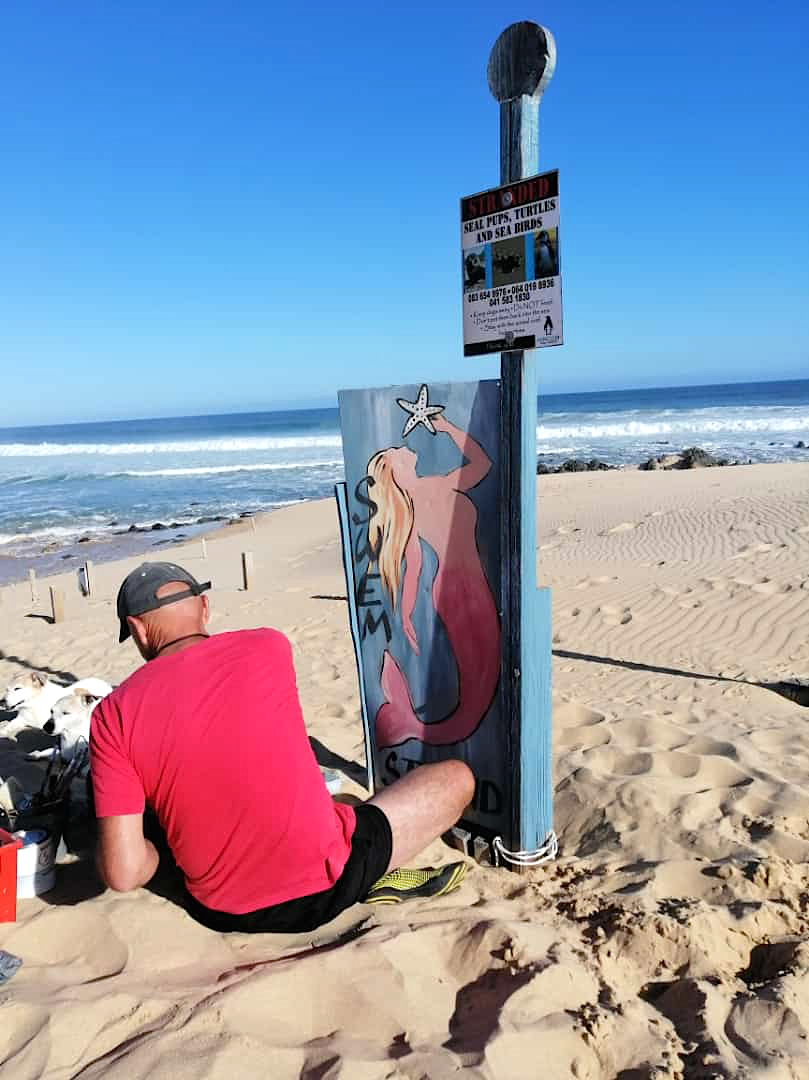 Painter on Cannon Rocks Beach