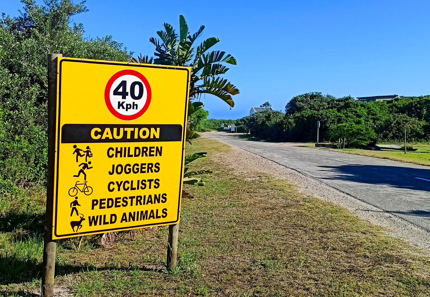 Road sign 40kph Caution Children Joggers Cyclists Pedestrians Wild Animals